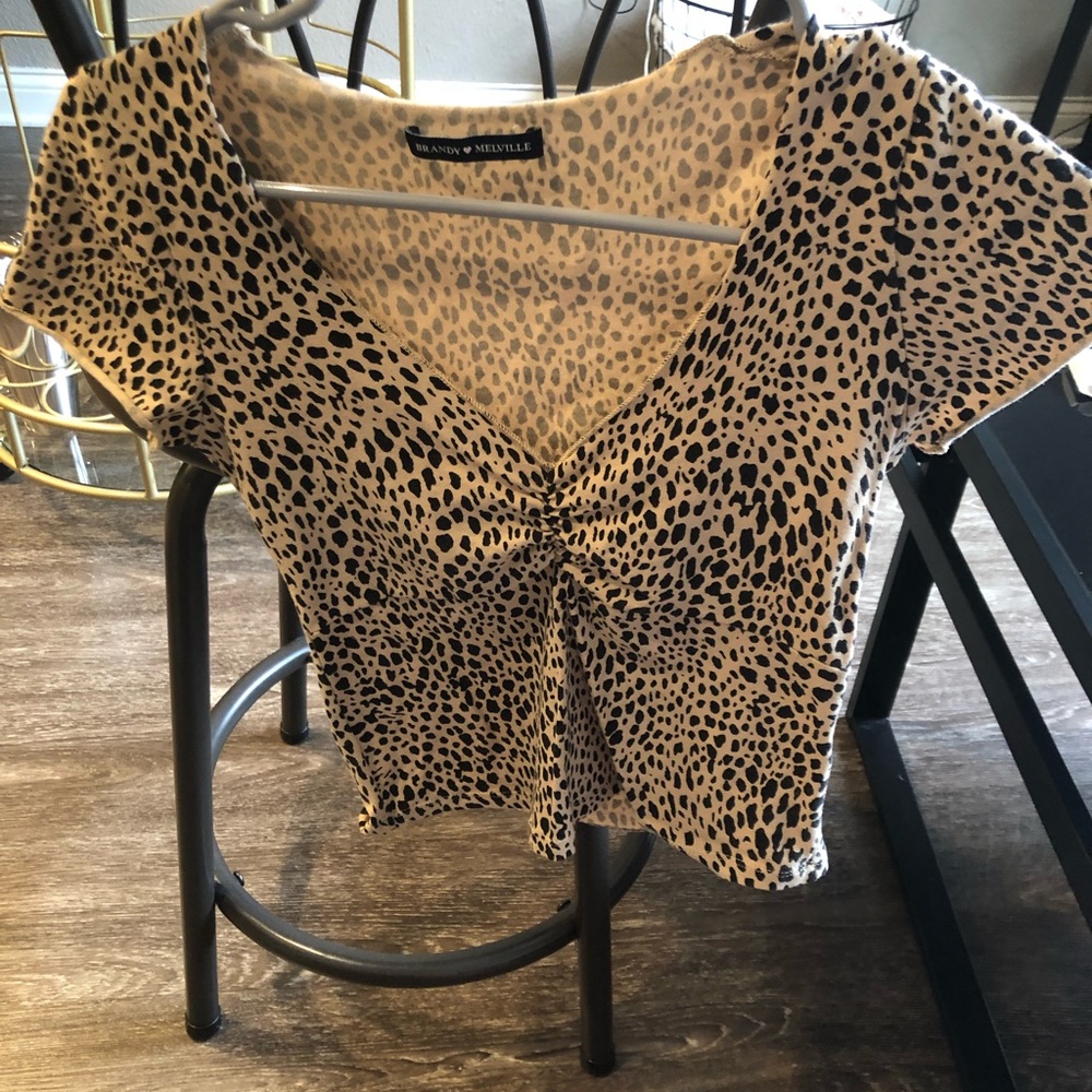 Brandy Melville shirt. Cheetah print. Worn. Size small